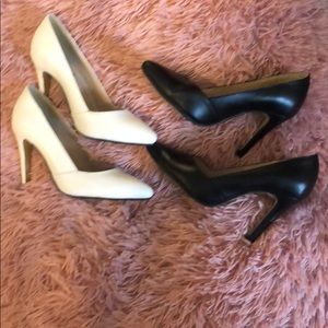 Two pairs of pumps. This size is 4 wide.